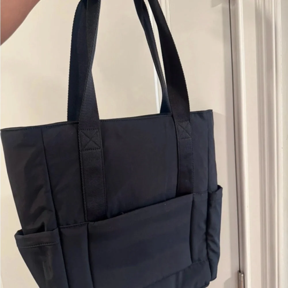 Calpak Black Tote with Front Pocket and Dual Straps - Picture 2 of 3